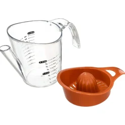 Exprimidor con vaso de medida