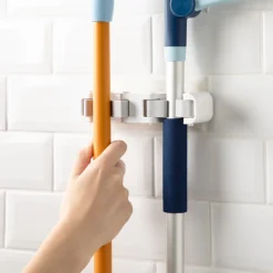 Soporte de pared para escoba multiuso